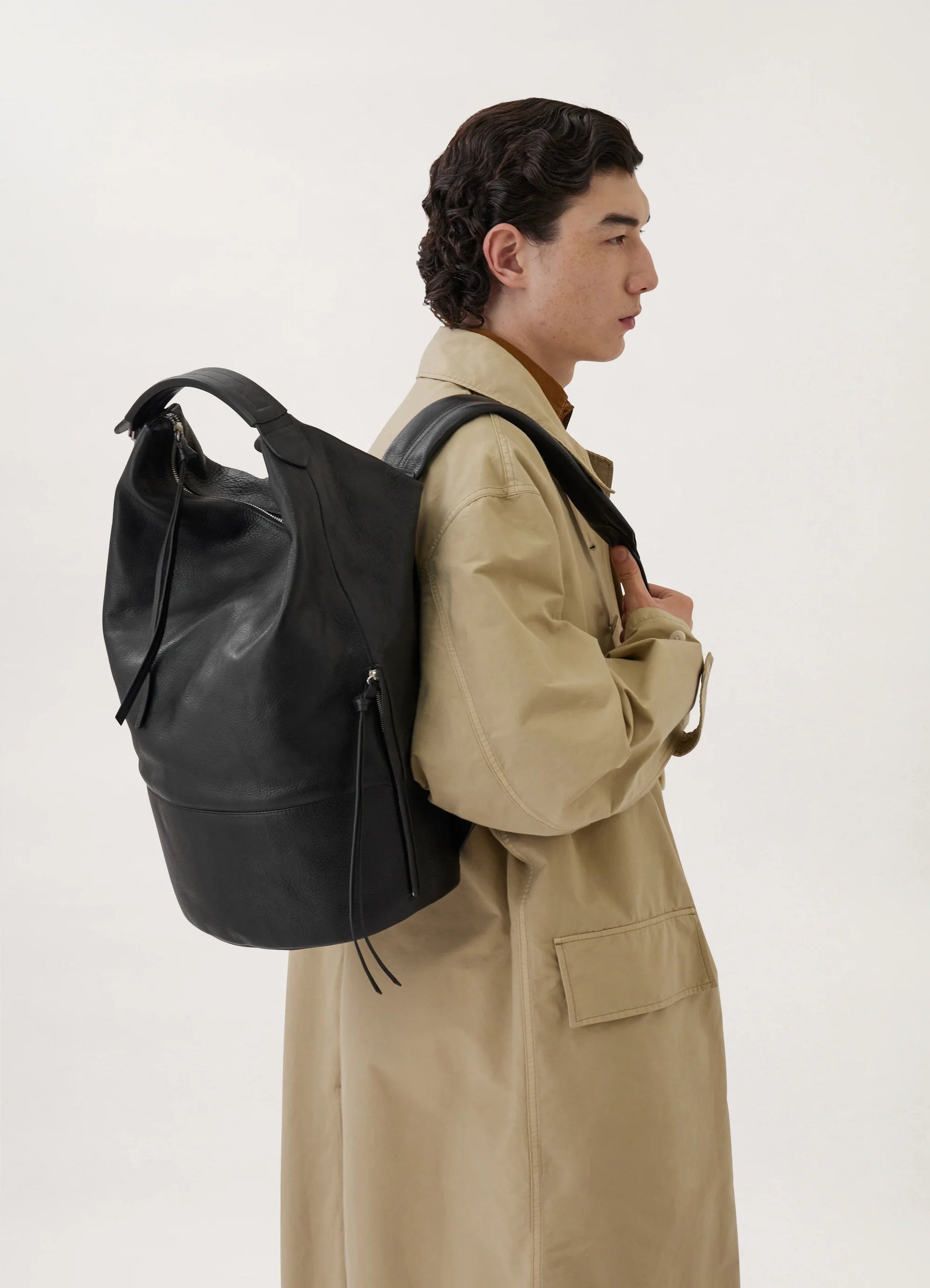 Convertible leather backpack bag that stands up