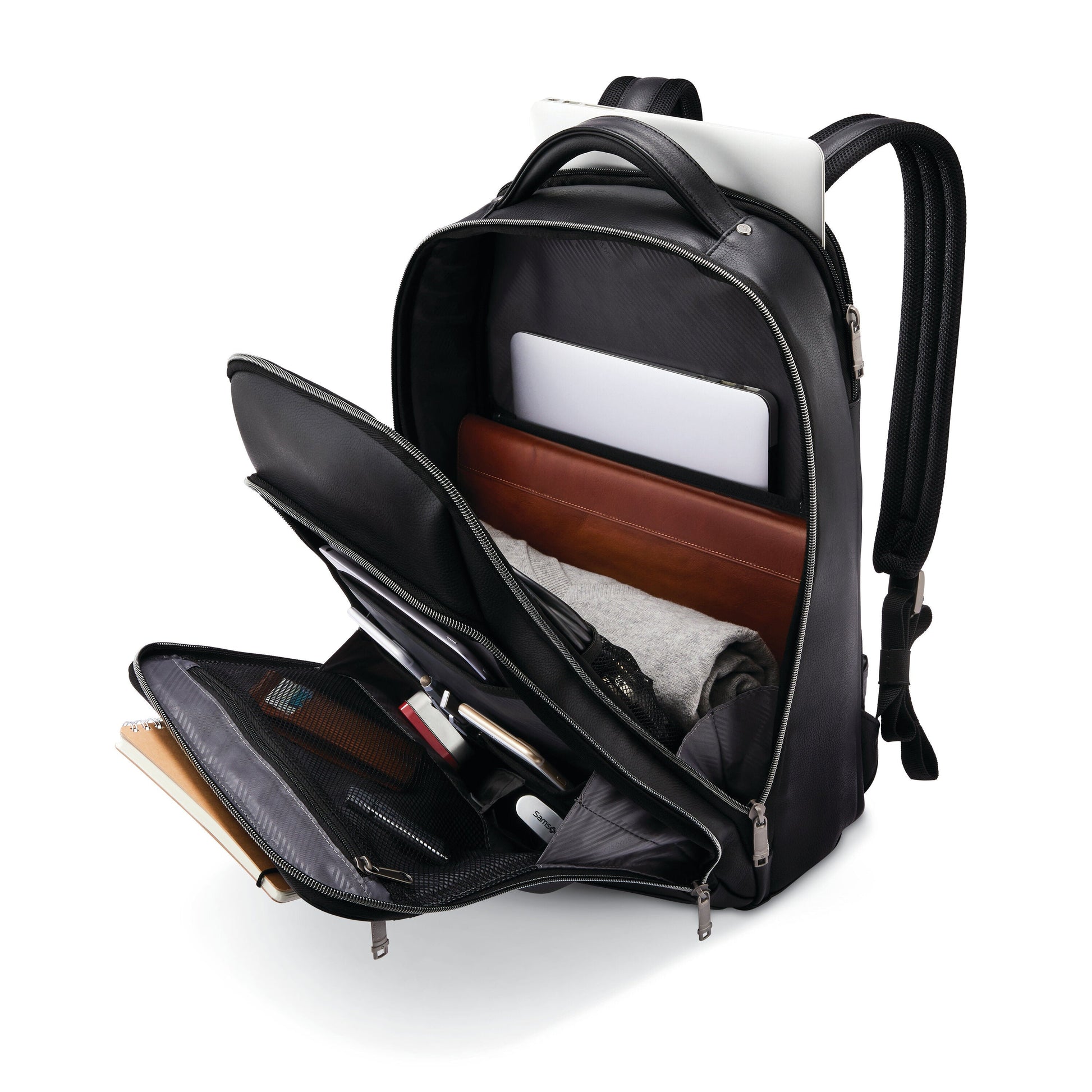 Leather backpack for business travel with separate laptop compartment