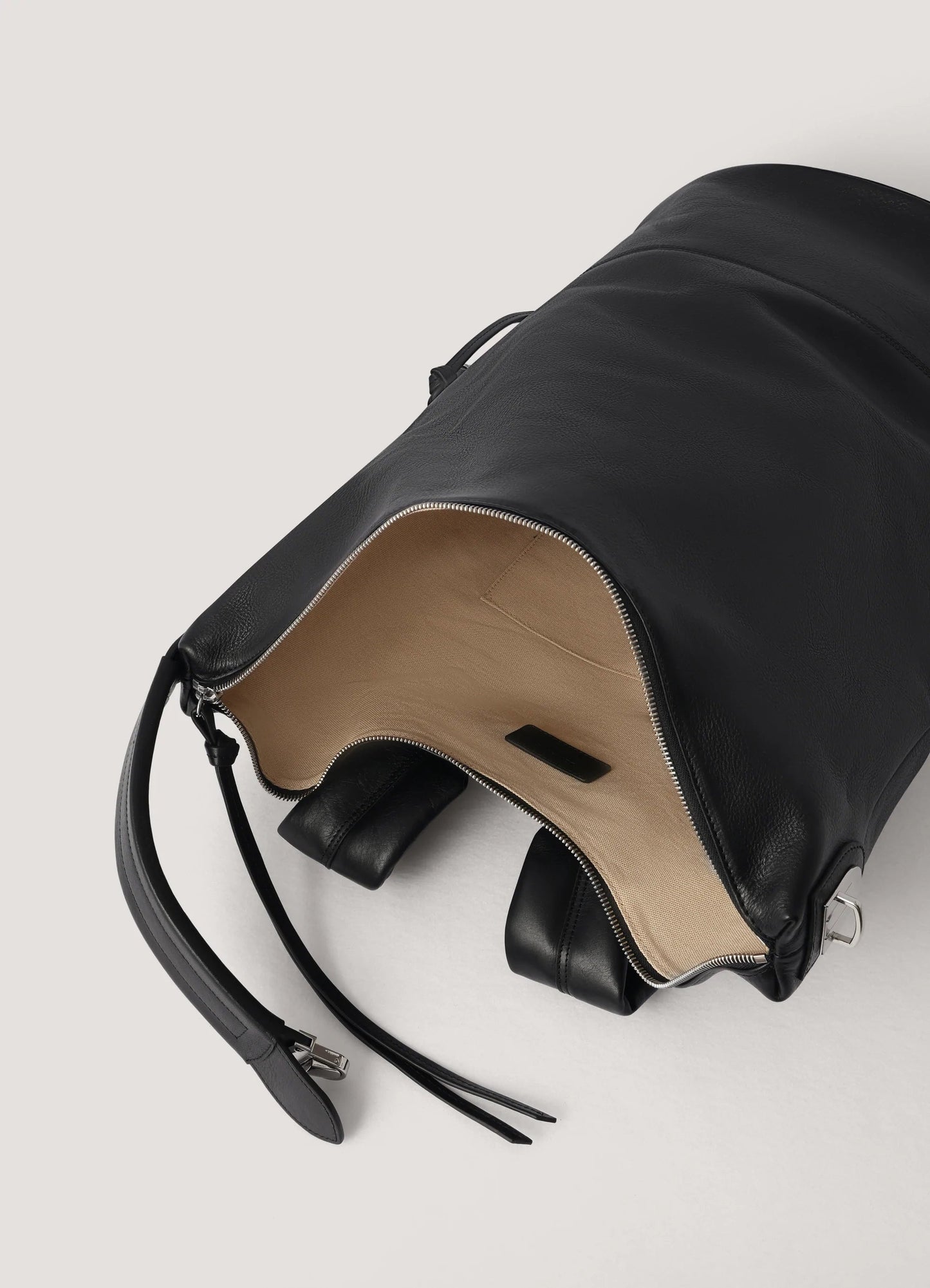 Convertible leather backpack bag that stands up