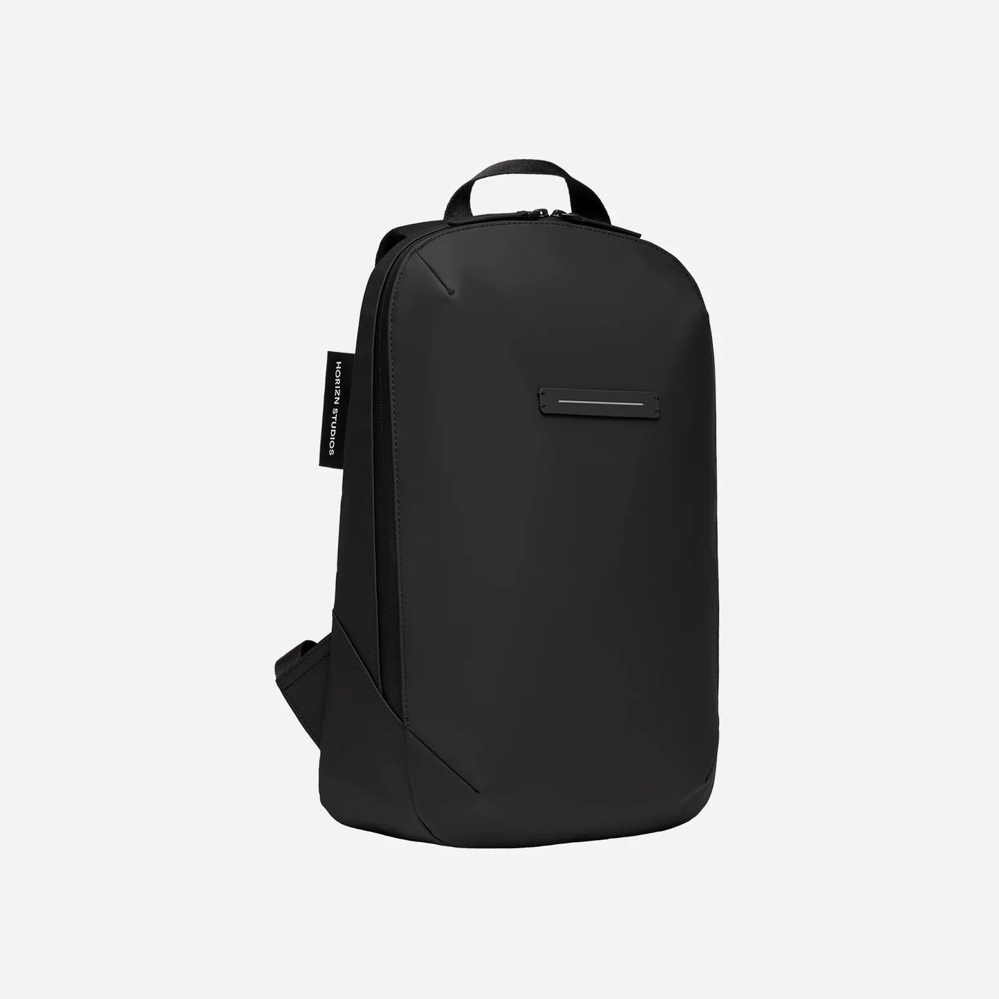 Minimalist slim waterproof backpack with luggage sleeve for work and travel 