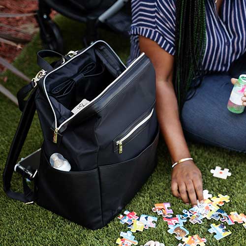 Convertible backpack with water bottle holder that stands up for women