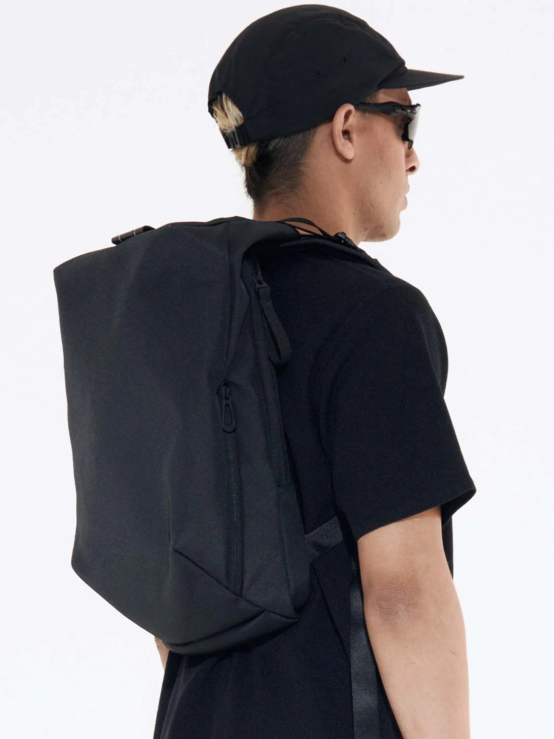 Minimalist recycled material backpack for work and travel