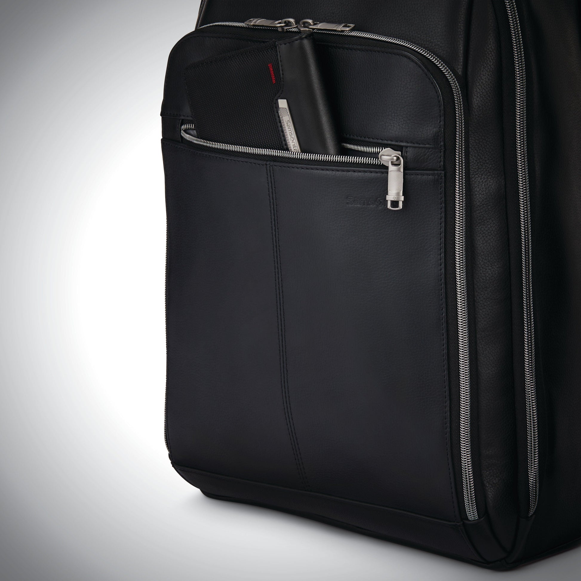 Leather backpack for business travel with separate laptop compartment