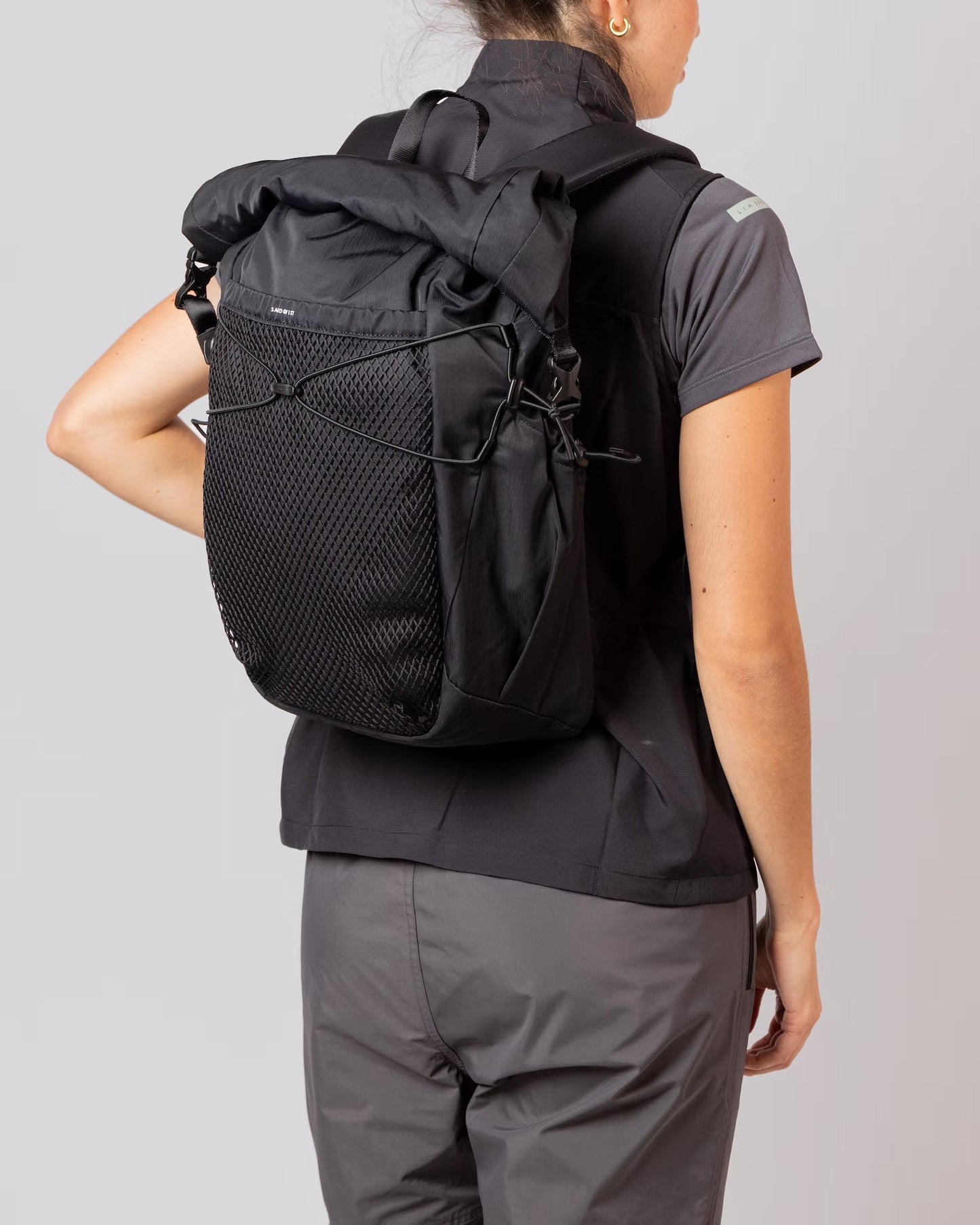 Expandable roll top backpack for laptop work and travel